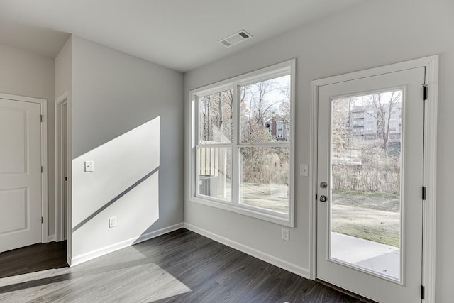 doorway featuring dark hardwood / wood-style flooring