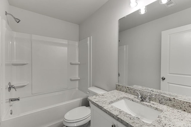 full bathroom featuring toilet, vanity, and shower / bathtub combination