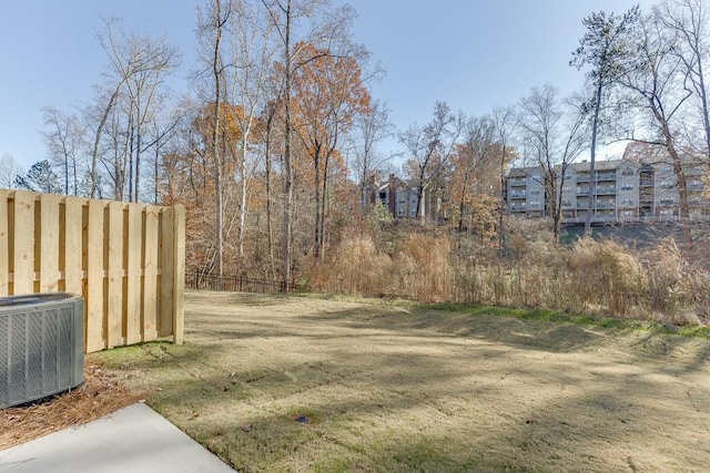 view of yard with central AC