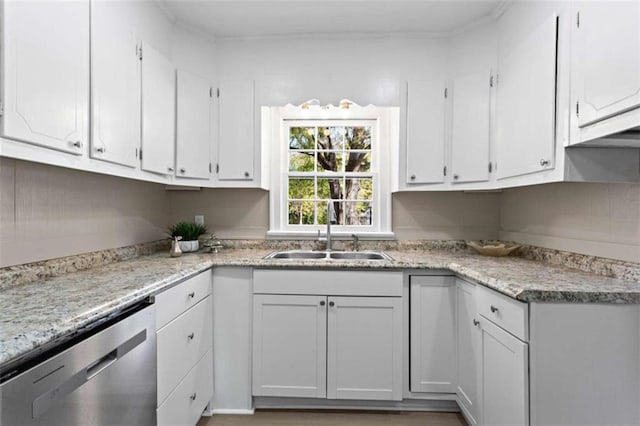 kitchen featuring sink, white cabinetry, crown molding, dishwasher, and light stone countertops