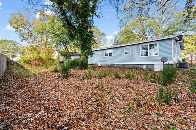 view of side of property featuring central AC unit