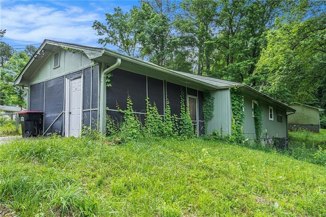 2087 Chestnut Way, Lithia Springs, GA 30122 - view of side of property featuring a sunroom