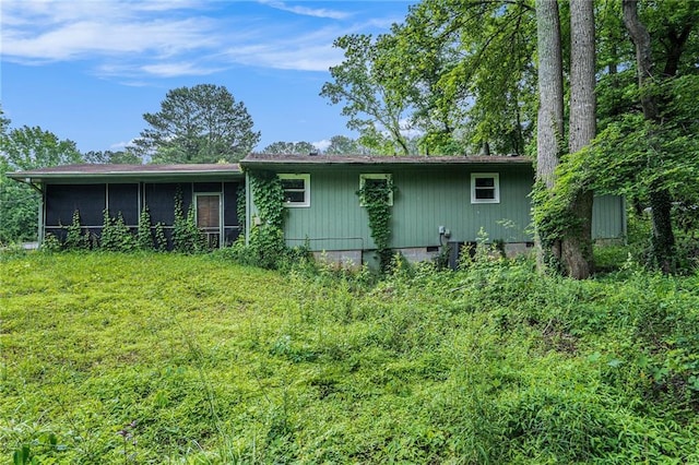 2087 Chestnut Way, Lithia Springs, GA 30122 - back of house featuring a sunroom and crawl space