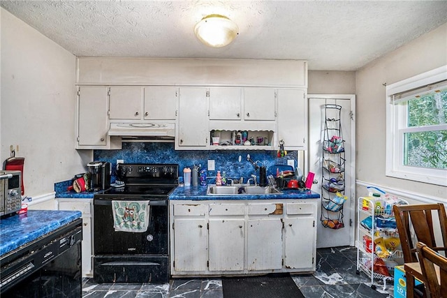 2087 Chestnut Way, Lithia Springs, GA 30122 - kitchen with black range with electric cooktop, under cabinet range hood, a sink, dark marble finish floors, and white cabinetry