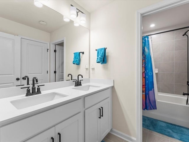 full bath featuring shower / tub combo, tile patterned floors, a sink, and double vanity