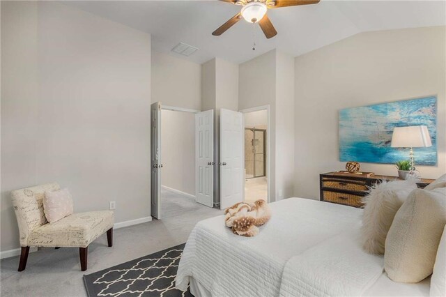 carpeted bedroom featuring a ceiling fan, lofted ceiling, baseboards, and visible vents