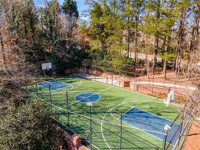 view of sport court featuring community basketball court and fence