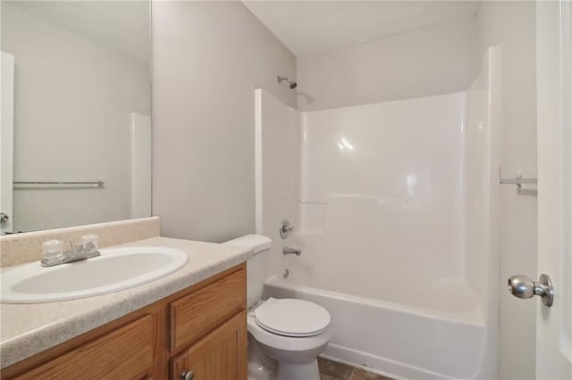 full bathroom featuring vanity, shower / tub combination, and toilet