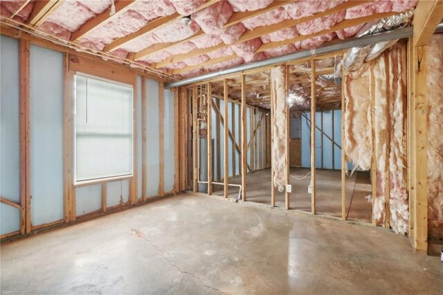 basement featuring electric panel