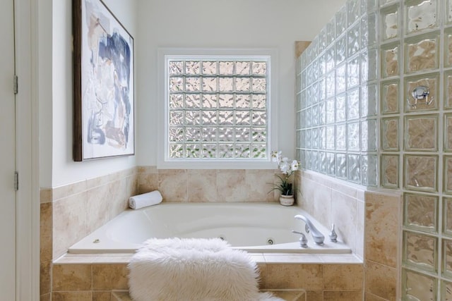 bathroom with a whirlpool tub