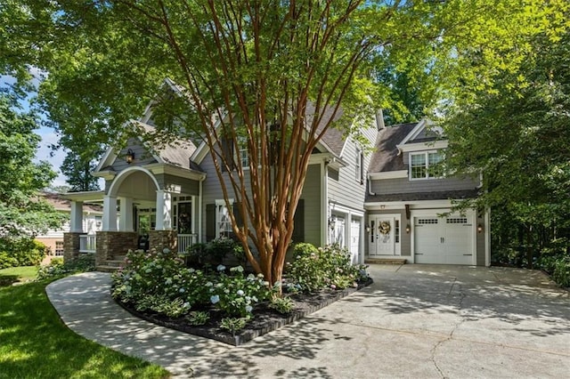 obstructed view of property featuring a garage