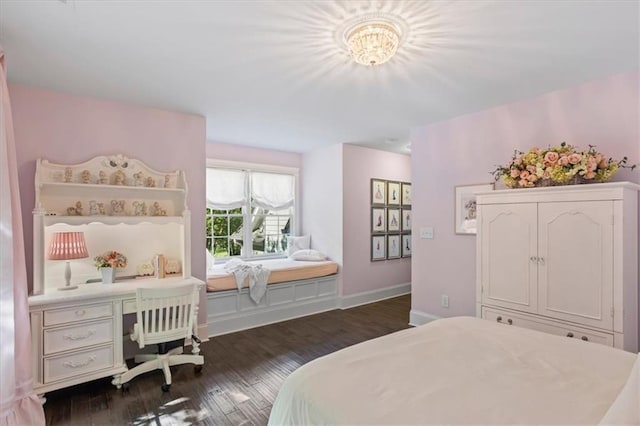 bedroom with dark wood-type flooring