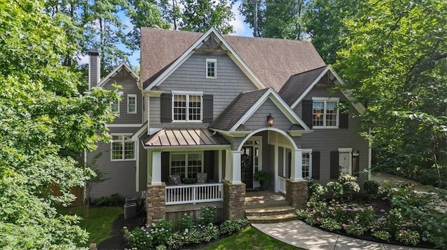 craftsman house featuring central AC and a porch