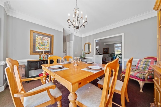 carpeted dining space featuring a notable chandelier and crown molding