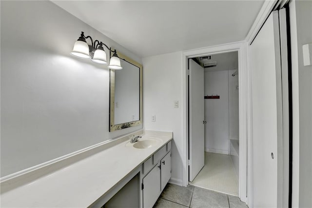 bathroom featuring tile patterned flooring, vanity, and independent shower and bath