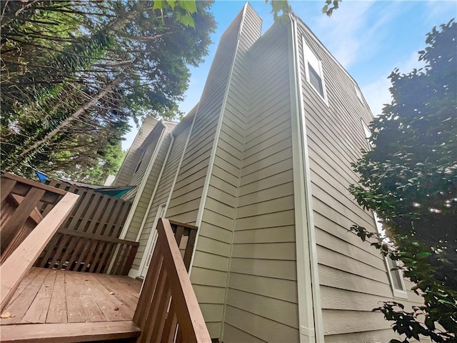 view of home's exterior with a deck