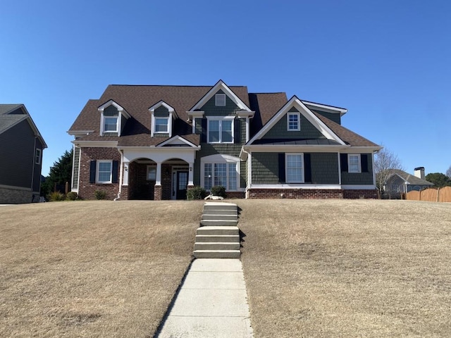 view of front of property featuring brick siding