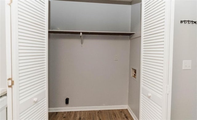 laundry room featuring hookup for a washing machine and dark hardwood / wood-style floors