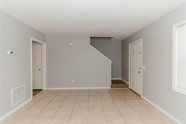 view of tiled spare room