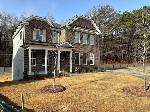 view of front of house with a front lawn