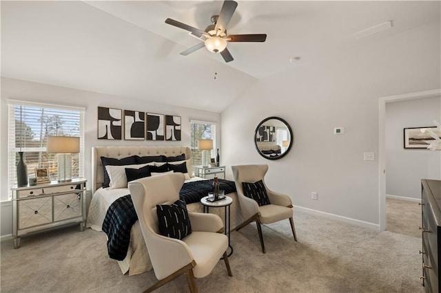 carpeted bedroom with ceiling fan and lofted ceiling