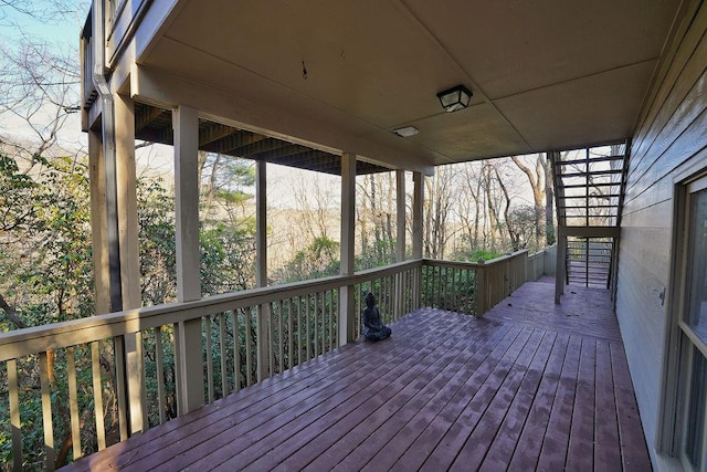wooden terrace featuring stairway