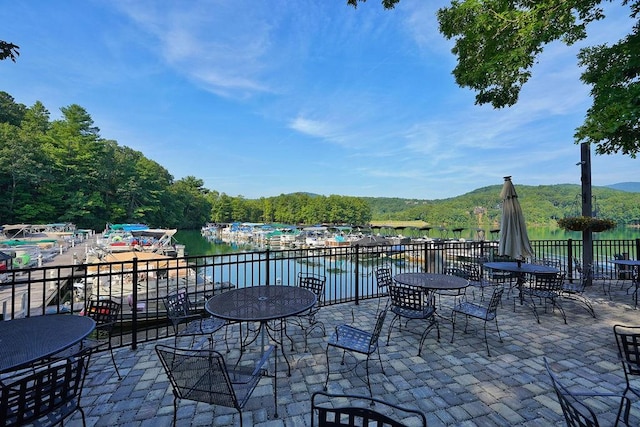 view of patio / terrace featuring a water view