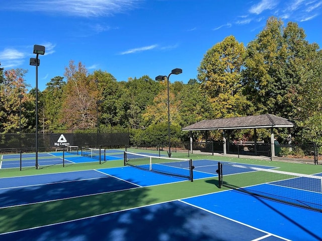 view of sport court featuring fence and community basketball court