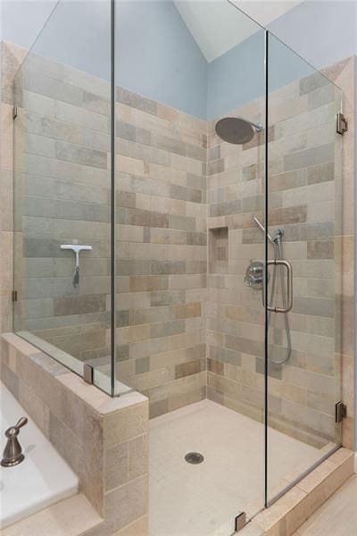 bathroom featuring walk in shower