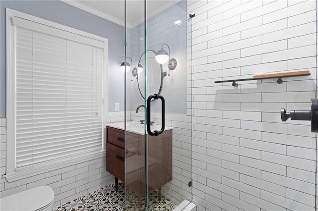 bathroom featuring tile walls, an enclosed shower, crown molding, and toilet