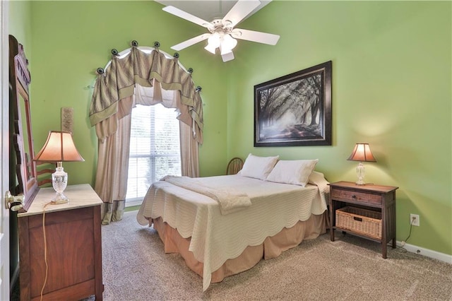 bedroom with light colored carpet and ceiling fan