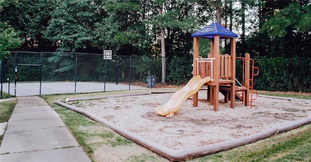 view of play area with basketball hoop