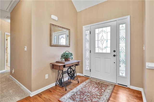 foyer entrance featuring wood-type flooring