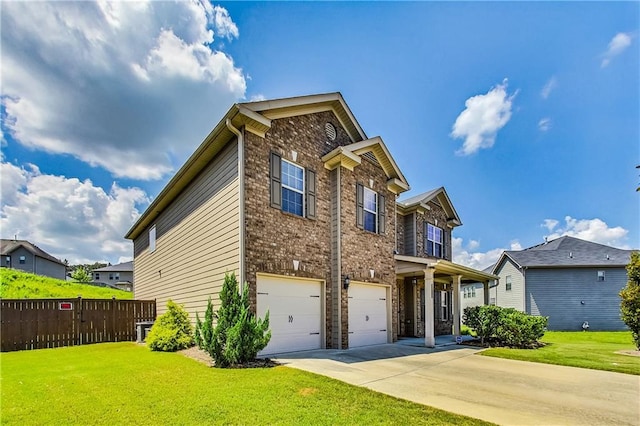 view of front of property with a garage and a front yard