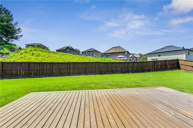 wooden deck with a yard