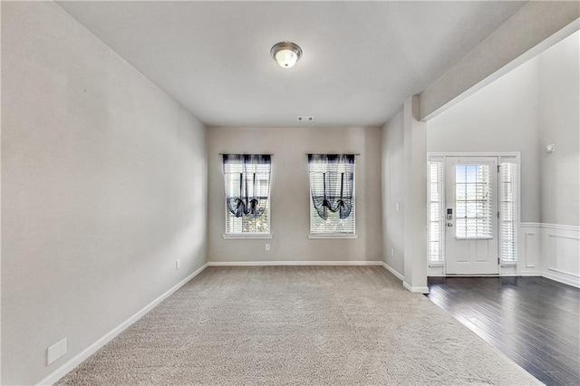 empty room with wood-type flooring