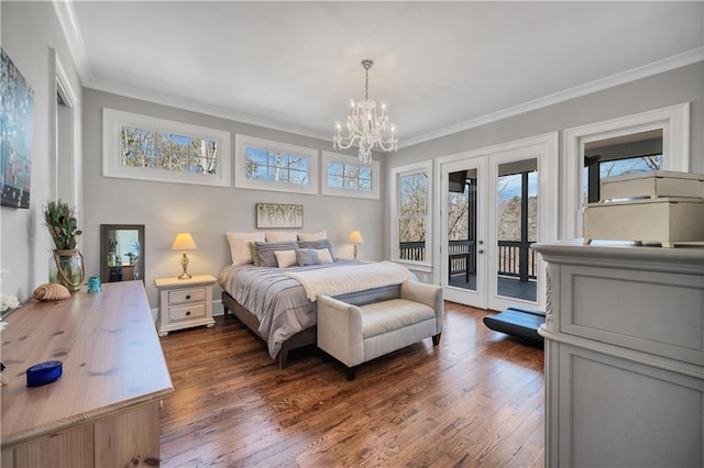 bedroom featuring an inviting chandelier, multiple windows, french doors, and access to exterior