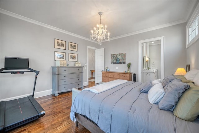 bedroom featuring ornamental molding, wood finished floors, baseboards, ensuite bath, and a notable chandelier