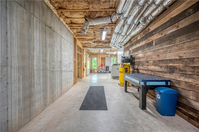 interior space featuring a garage and concrete floors