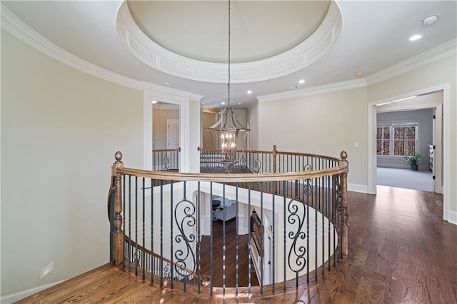 2260 Wood Falls Dr, Cumming, GA 30041 - hall with crown molding, wood finished floors, recessed lighting, a chandelier, and an upstairs landing