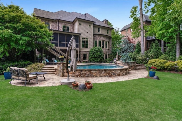 2260 Wood Falls Dr, Cumming, GA 30041 - view of swimming pool featuring a patio and a pool with connected hot tub