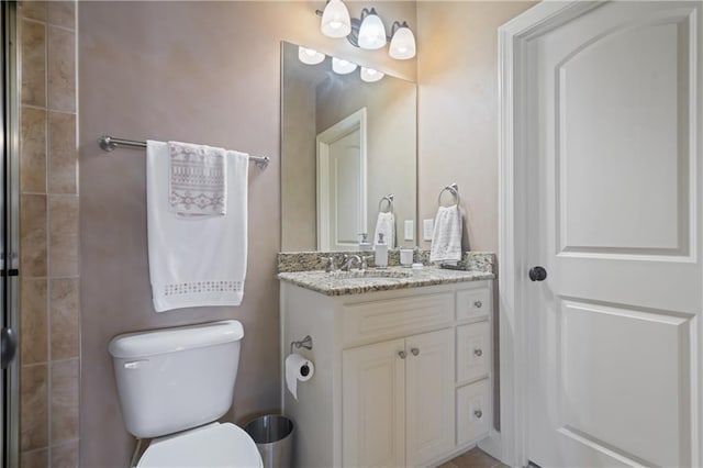 2260 Wood Falls Dr, Cumming, GA 30041 - full bathroom featuring vanity and toilet