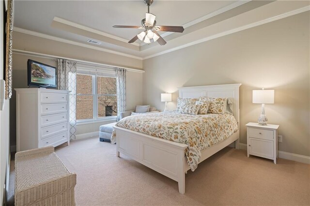 2260 Wood Falls Dr, Cumming, GA 30041 - bedroom with visible vents, ornamental molding, a raised ceiling, and light carpet