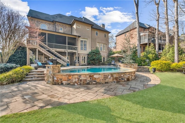 2260 Wood Falls Dr, Cumming, GA 30041 - view of patio featuring stairs, outdoor dining area, and an outdoor pool