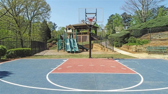 2260 Wood Falls Dr, Cumming, GA 30041 - view of sport court with basketball court, fence, and a playground