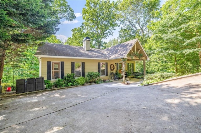 view of front of property with a chimney