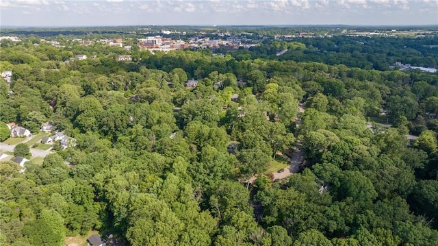 aerial overview of property's location featuring a forest