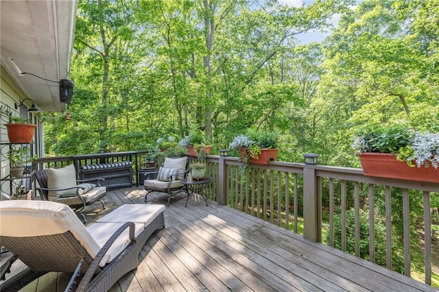 wooden deck with an outdoor hangout area