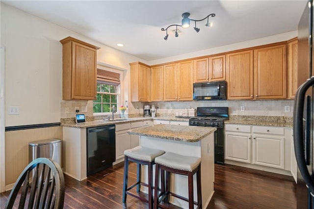 1360 Woodvine Way, Alpharetta, GA 30005 - kitchen featuring black appliances, a sink, dark wood-style floors, tasteful backsplash, and a wainscoted wall