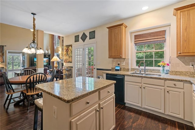 1360 Woodvine Way, Alpharetta, GA 30005 - kitchen featuring black dishwasher, a sink, healthy amount of natural light, dark wood-type flooring, and recessed lighting